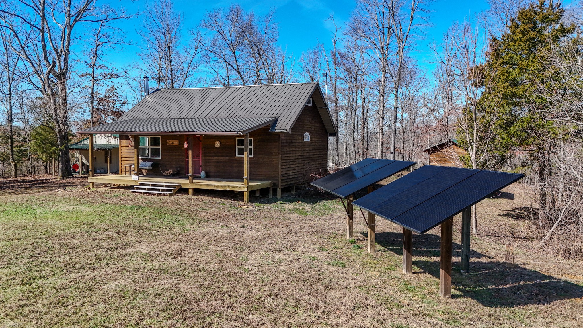 0 Bunker Hill Road Linden, TN 37096 - Photo 30 of 65 a view of a house with a yard wooden fence and a bench
