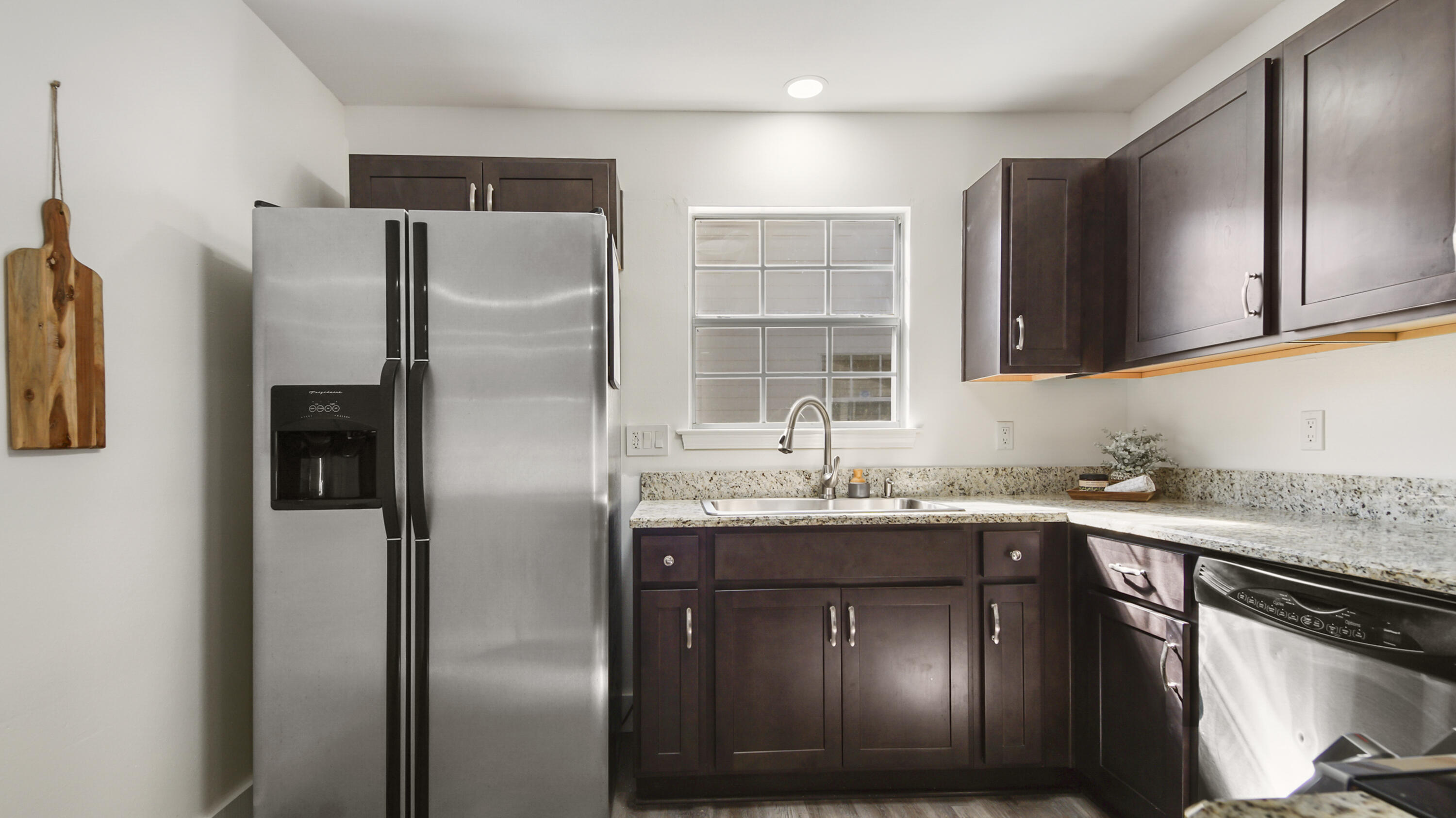 44 Ruby Circle Mary Esther, FL 32569 - Photo 12 of 34 a kitchen with stainless steel appliances granite countertop a refrigerator a sink a stove and island