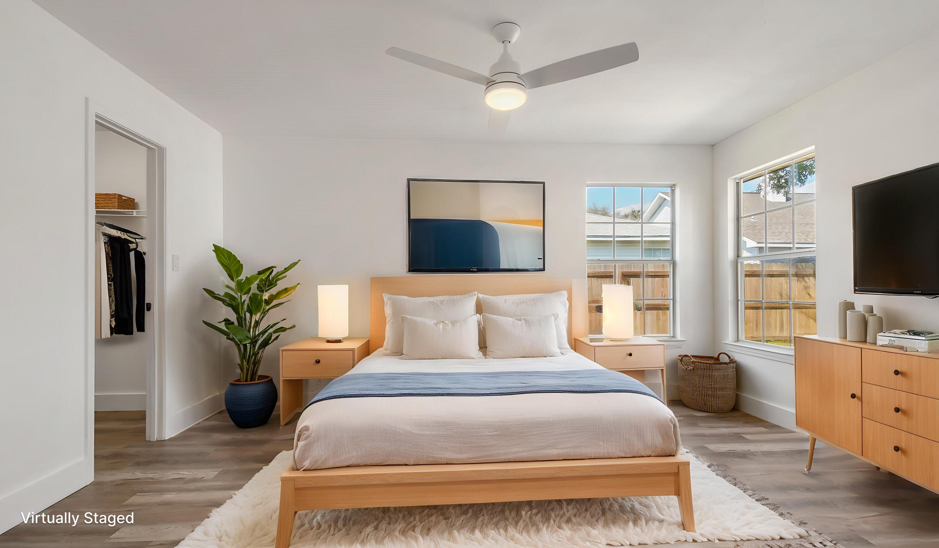 44 Ruby Circle Mary Esther, FL 32569 - Photo 17 of 34 a bedroom with a large bed and a flat screen tv