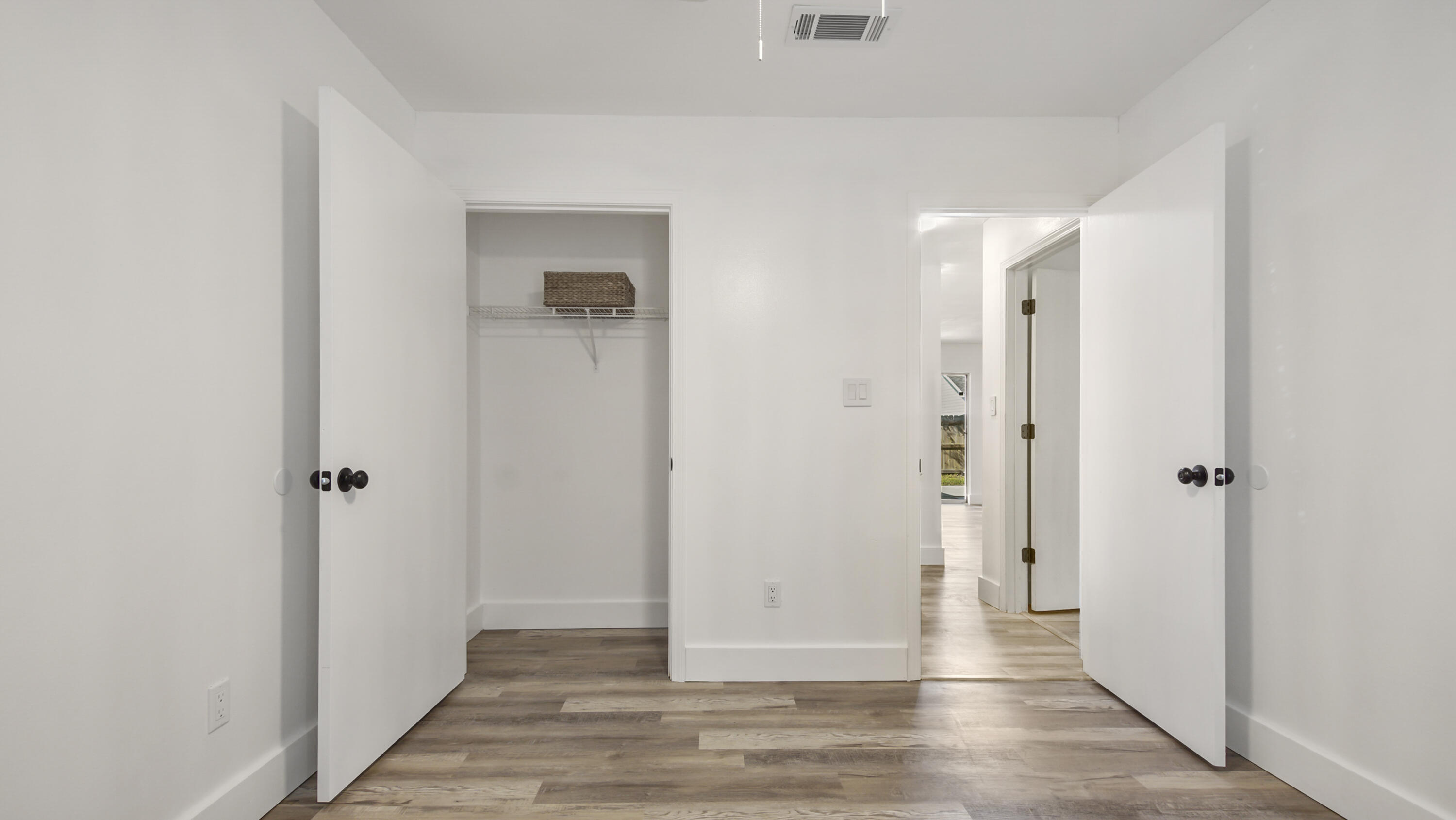 44 Ruby Circle Mary Esther, FL 32569 - Photo 29 of 34 a view of a hallway with wooden floor