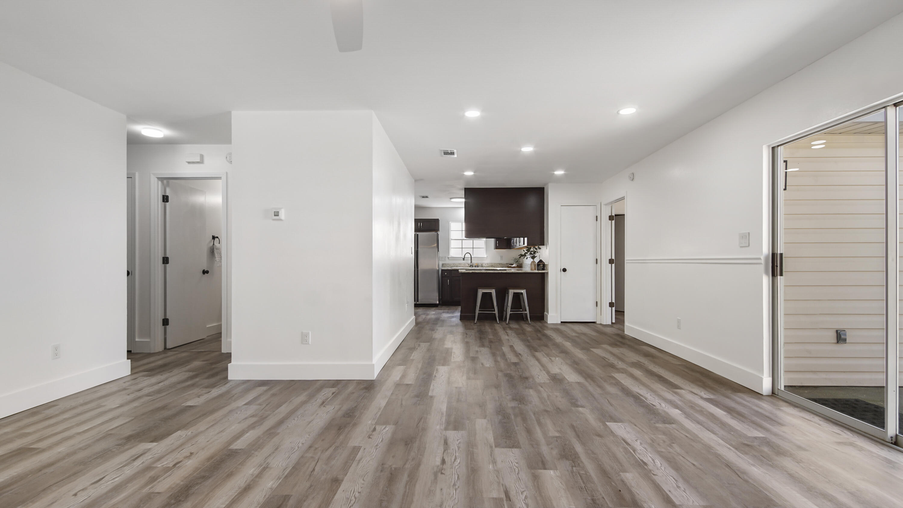 44 Ruby Circle Mary Esther, FL 32569 - Photo 7 of 34 a view of kitchen with cabinets and wooden floor