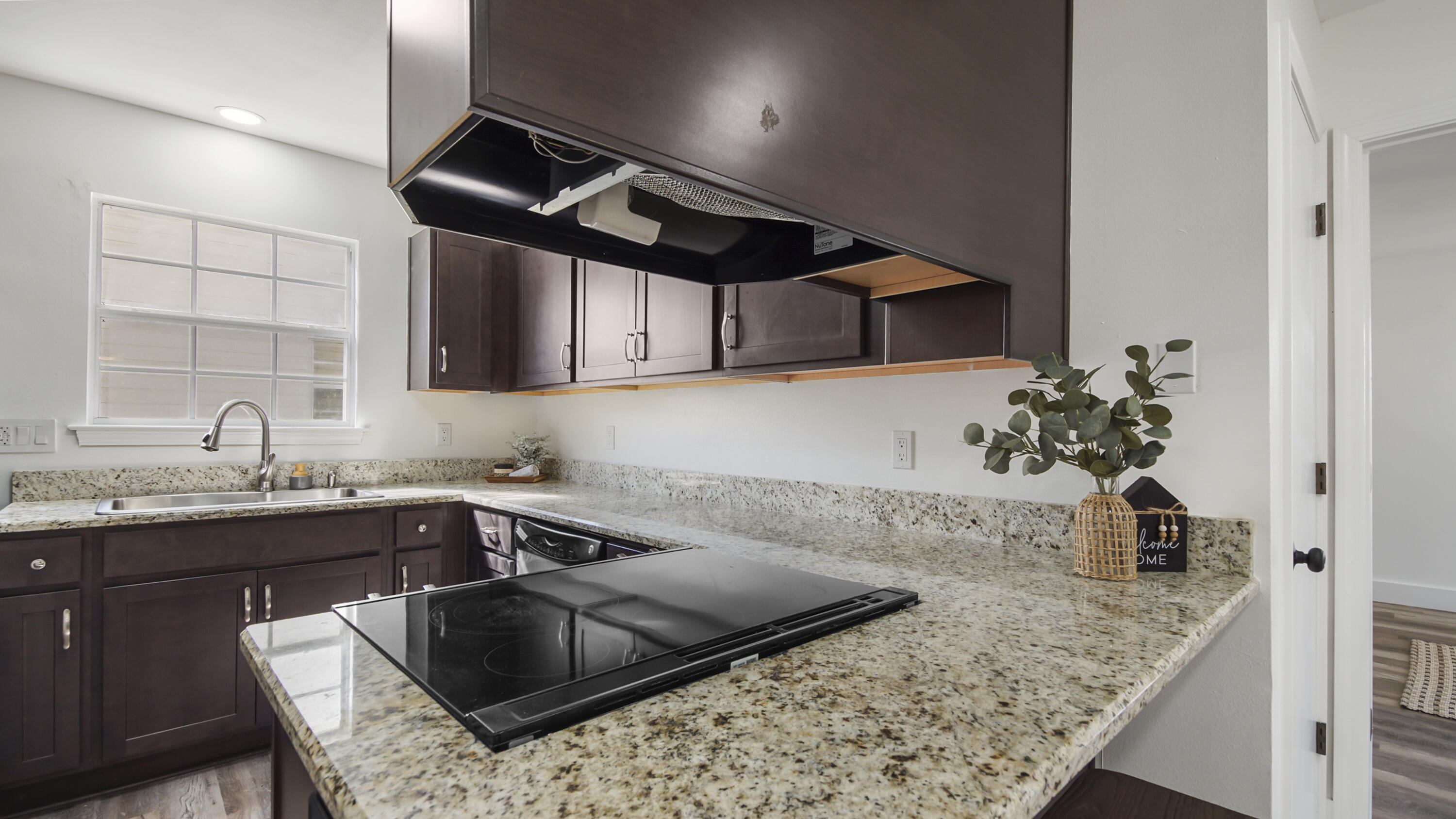 44 Ruby Circle Mary Esther, FL 32569 - Photo 10 of 34 a kitchen with a sink and cabinets