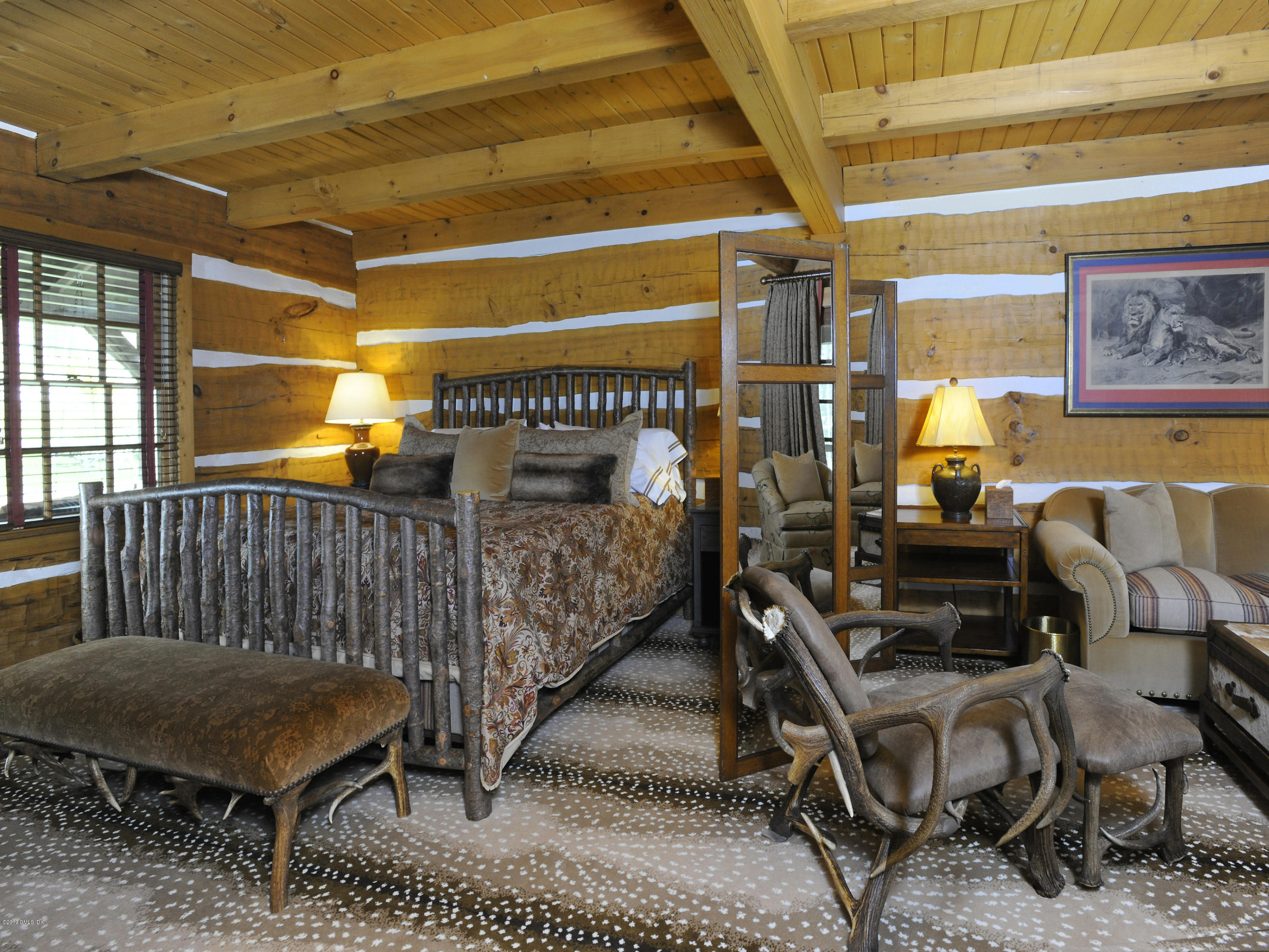 74 Upper Cross Road Greenwich, CT 06831 - Photo 18 of 21 a bedroom with furniture and a window