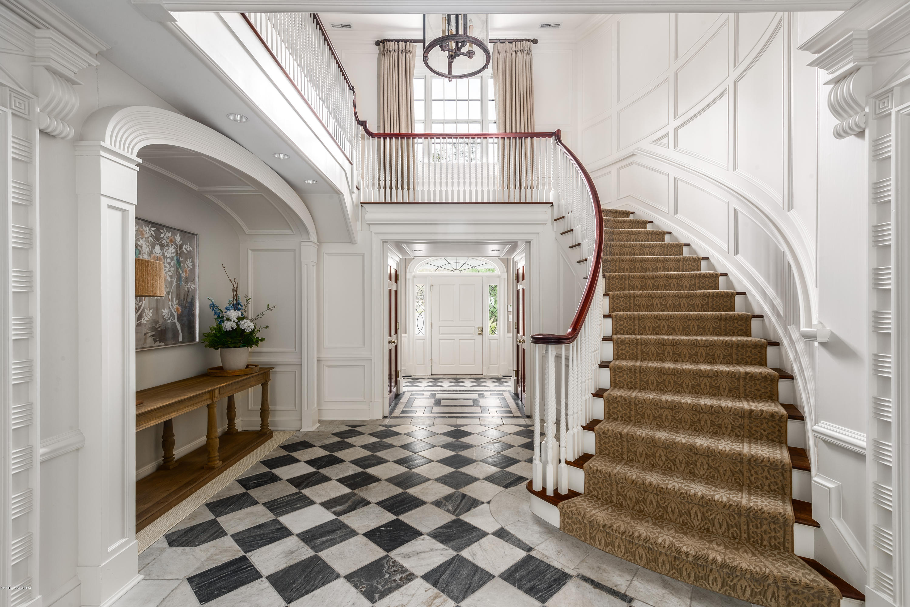 74 Upper Cross Road Greenwich, CT 06831 - Photo 3 of 21 a view of entryway and hall with wooden floor