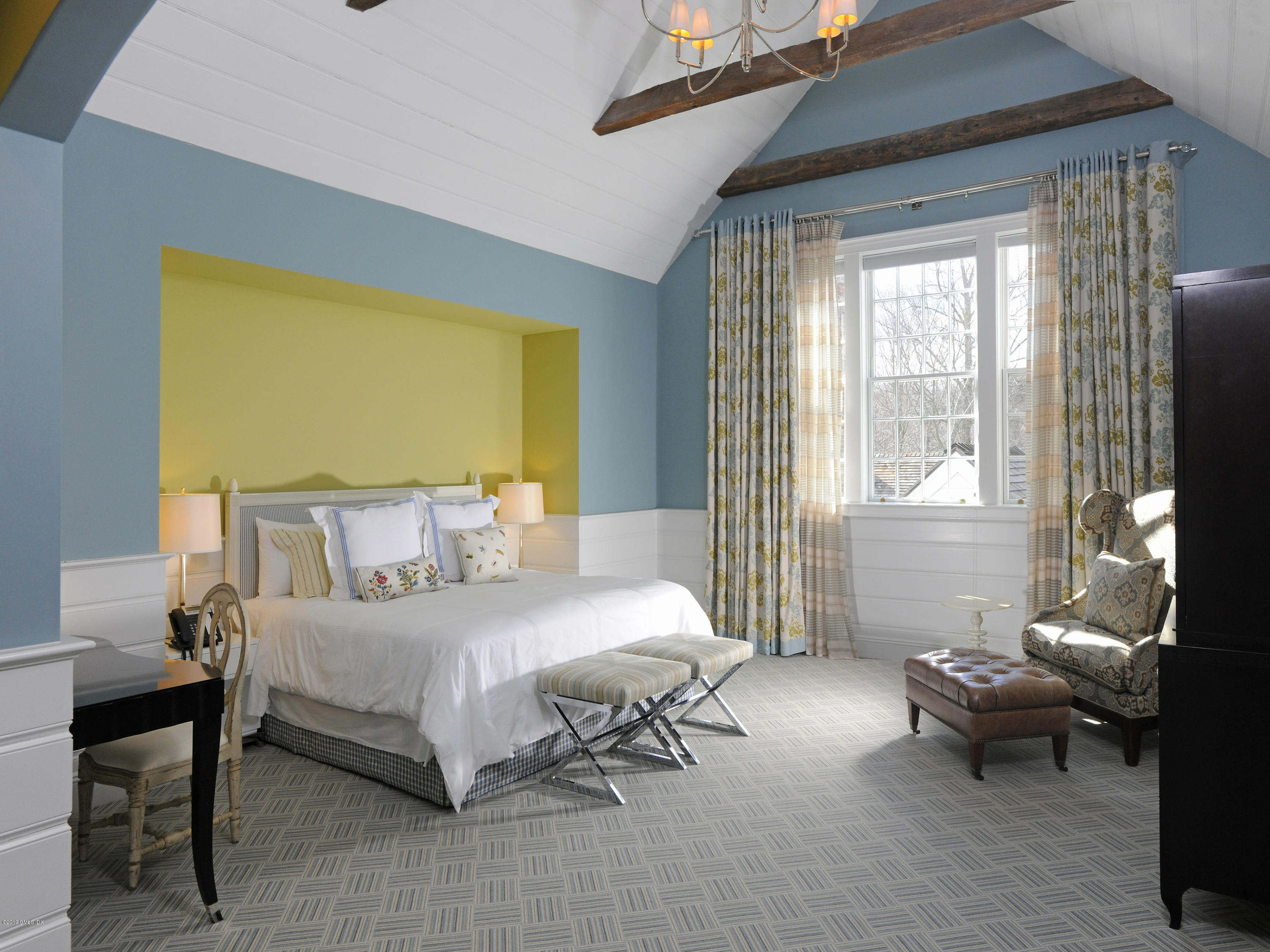 74 Upper Cross Road Greenwich, CT 06831 - Photo 9 of 21 a bedroom with a bed and a window