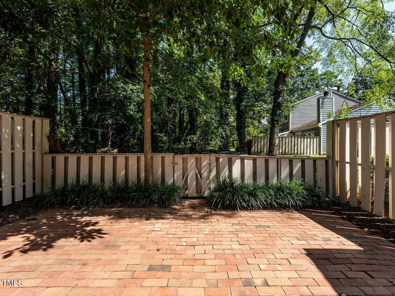 837 Green Ridge Drive Raleigh, NC 27609 - Photo 26 of 29 Fenced back patio