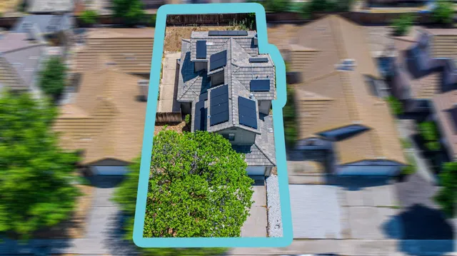 a backyard of a house with lots of green space