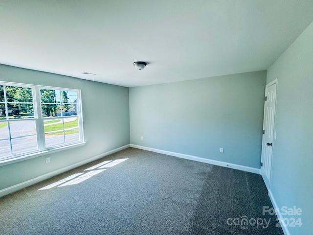 5103 Lakeview Road Charlotte, NC 28216 - Photo 11 of 12 an empty room with a window