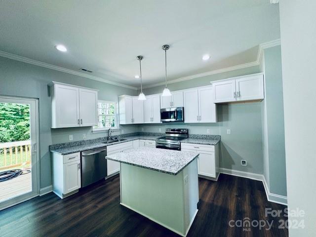 5103 Lakeview Road Charlotte, NC 28216 - Photo 3 of 12 a kitchen with a sink stove and cabinets