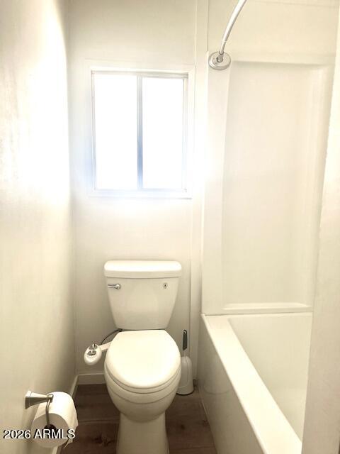 2605 South Tomahawk Road, Unit 187 Apache Junction, AZ 85119 - Photo 14 of 34 a bathroom with a toilet and a shower