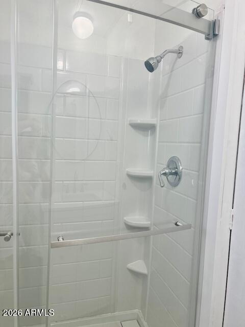 2605 South Tomahawk Road, Unit 187 Apache Junction, AZ 85119 - Photo 22 of 33 a bathroom with a shower