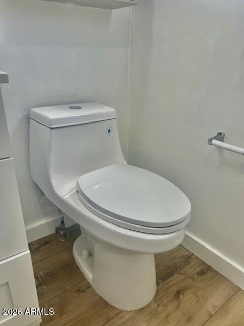 2605 South Tomahawk Road, Unit 187 Apache Junction, AZ 85119 - Photo 25 of 33 a white toilet sitting next to a white toilet