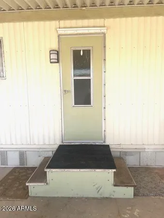 a white building with a door