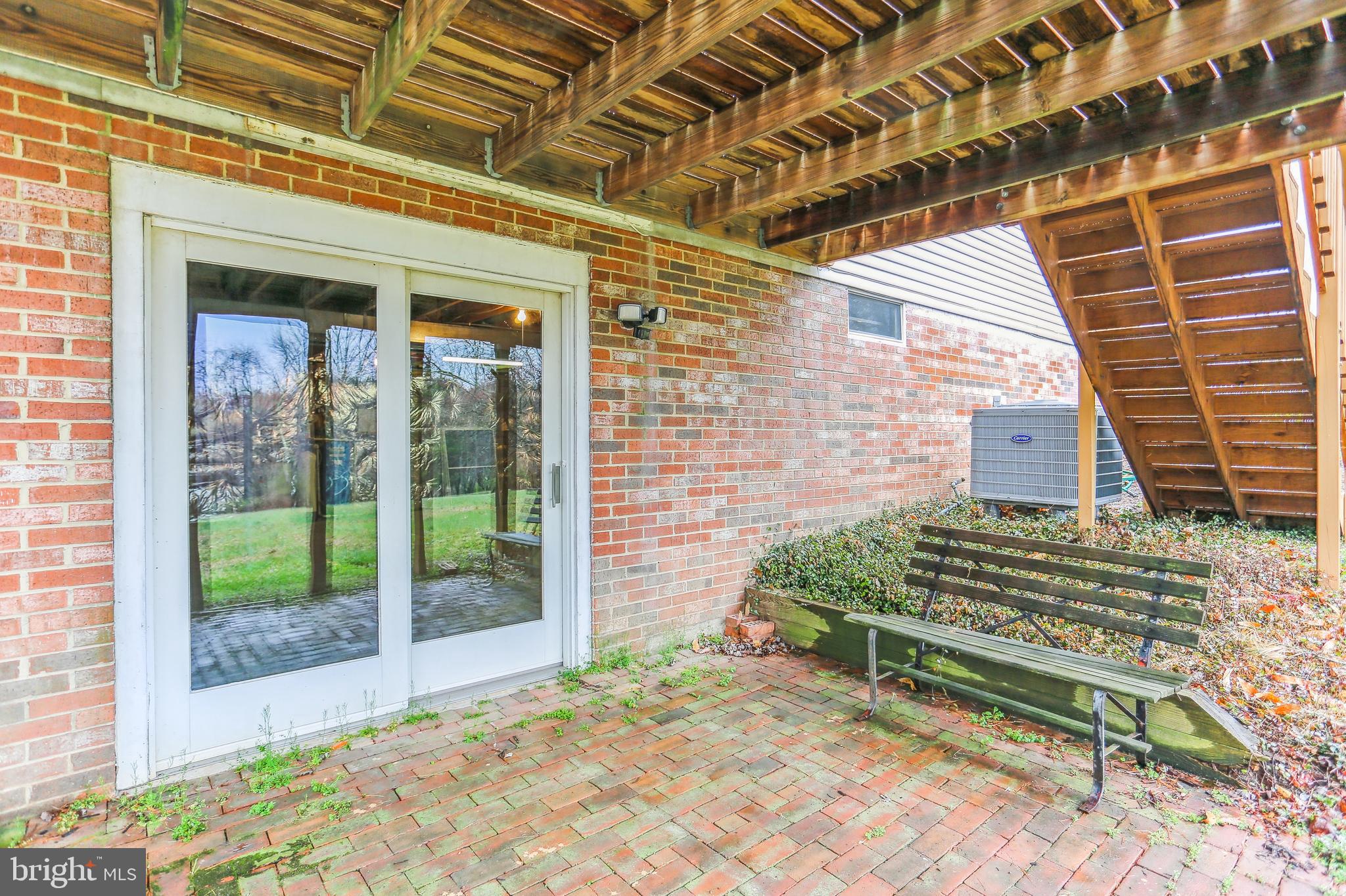 9730 Wightman Road Gaithersburg, MD 20882 - Photo 61 of 64 Patio is off of the lower level basement