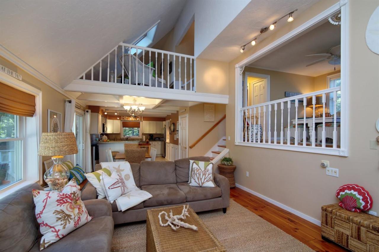 71 Captain Carltons Road Cotuit, MA 02635 - Photo 3 of 21 a living room with furniture and stairs