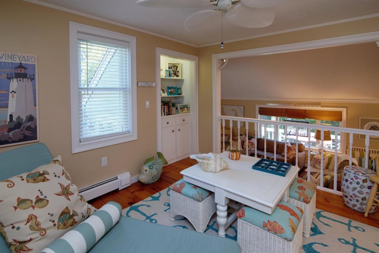 71 Captain Carltons Road Cotuit, MA 02635 - Photo 8 of 21 a living room with furniture and wooden floor
