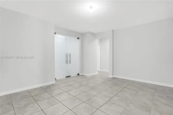 a bathroom with a double vanity sink mirror and