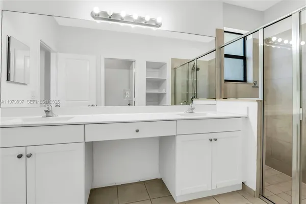 a view of an empty room with windows