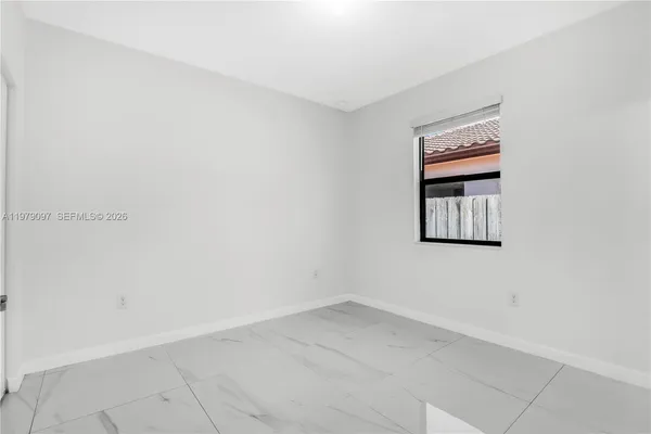 a view of a house with swimming pool