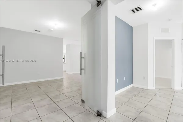 a view of a house with a swimming pool