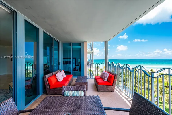 view of outdoor space with deck and plants