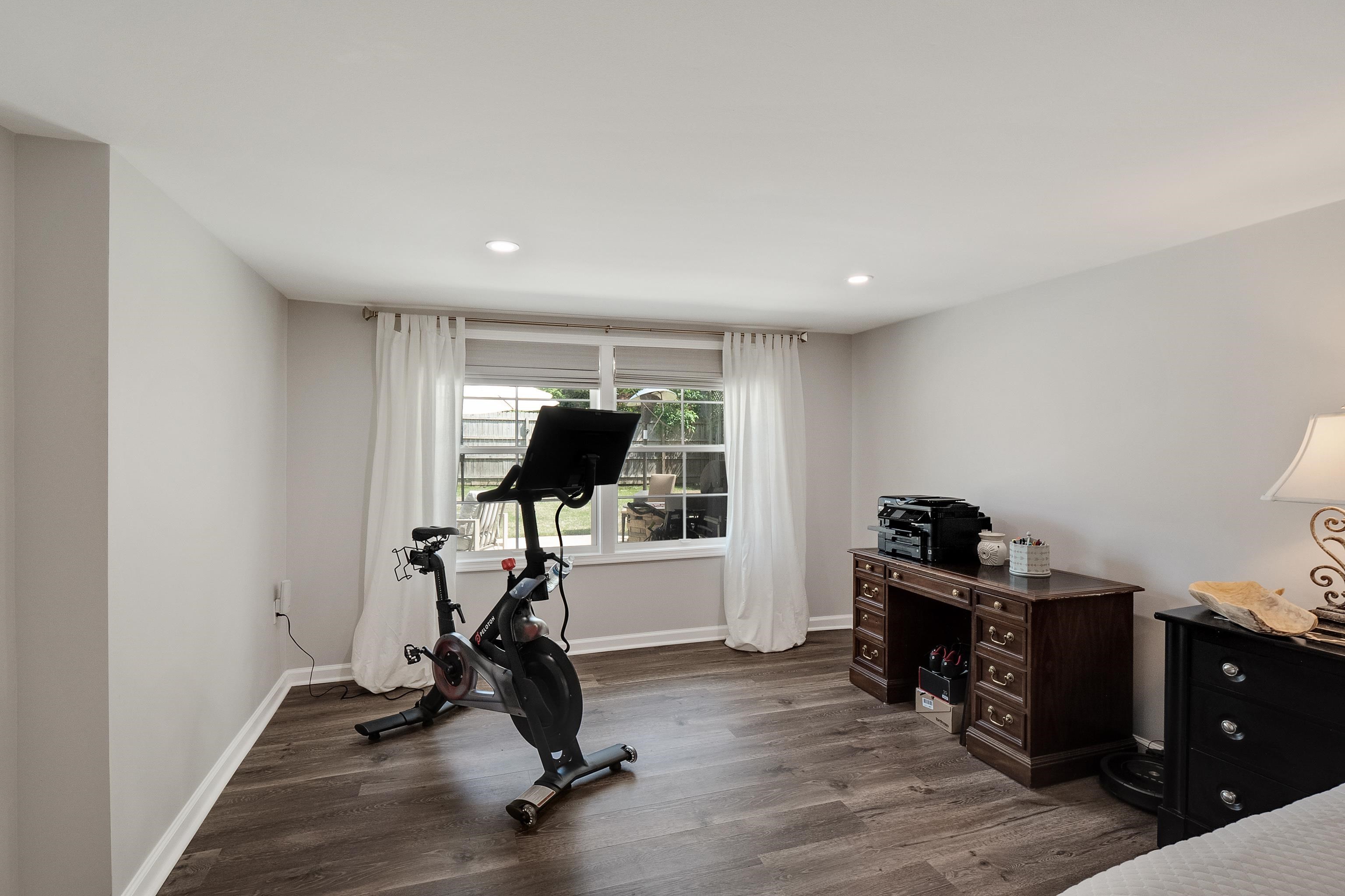 4800 Barfield Road Memphis, TN 38117 - Photo 20 of 25 a view of room with gym equipment and a window
