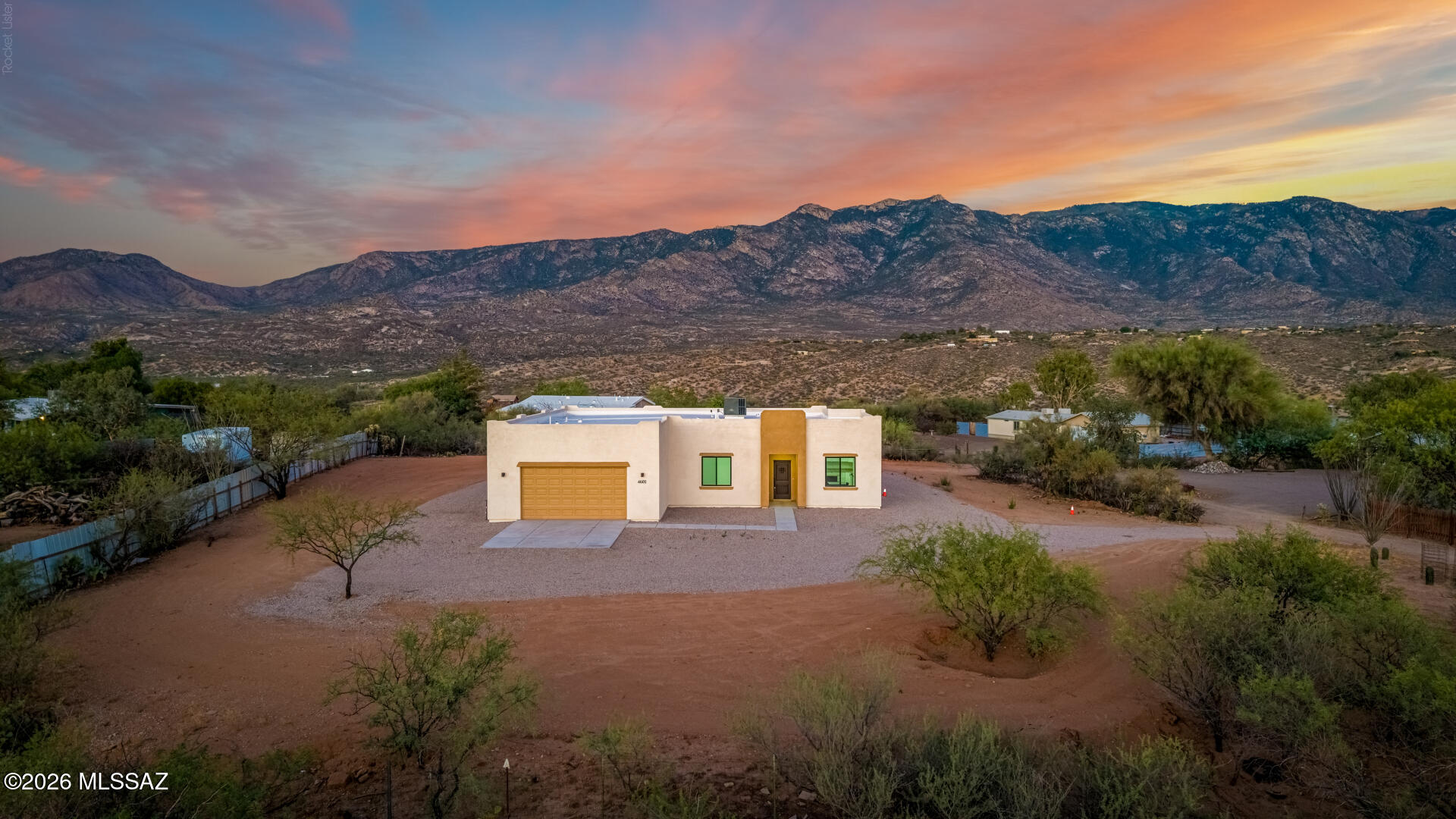 4601 East Magoo Road Tucson, AZ 85739 - Photo 1 of 38 a view of a house with a field