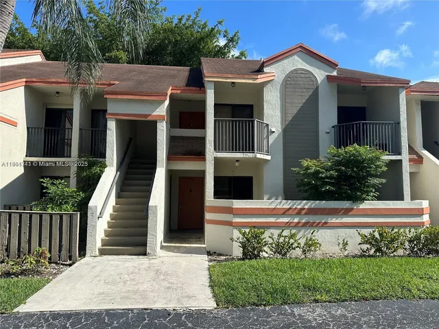 a front view of a house with a porch