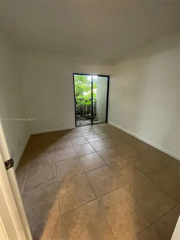 a bathroom with a sink toilet vanity and shower