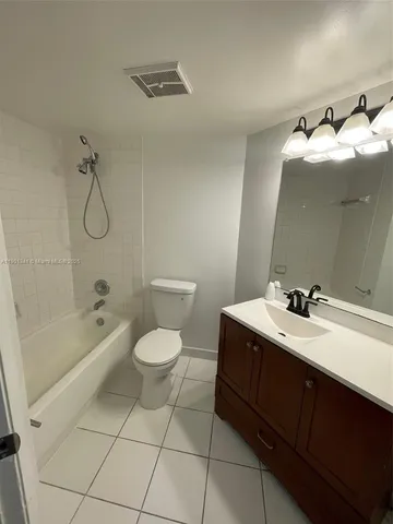 a bed room with a bed and a couch