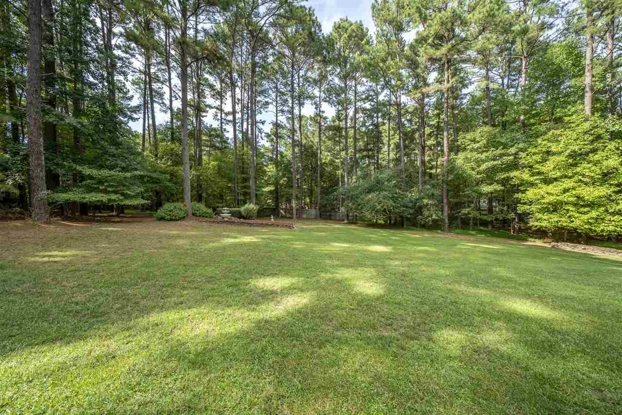 209 Claflin Court Raleigh, NC 27614 - Photo 27 of 30 Large, flat, fenced, private backyard is large enough to install a custom pool and cabana. Backyard
