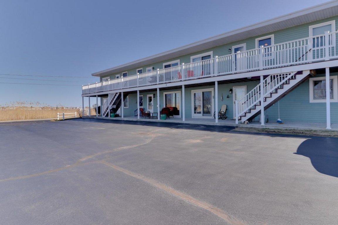 85 Mile Road, Unit BLD 2 U8 Wells, ME 04090 - Photo 1 of 7 Sea-Marsh-Exterior