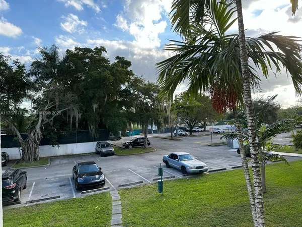 a view of building with yard