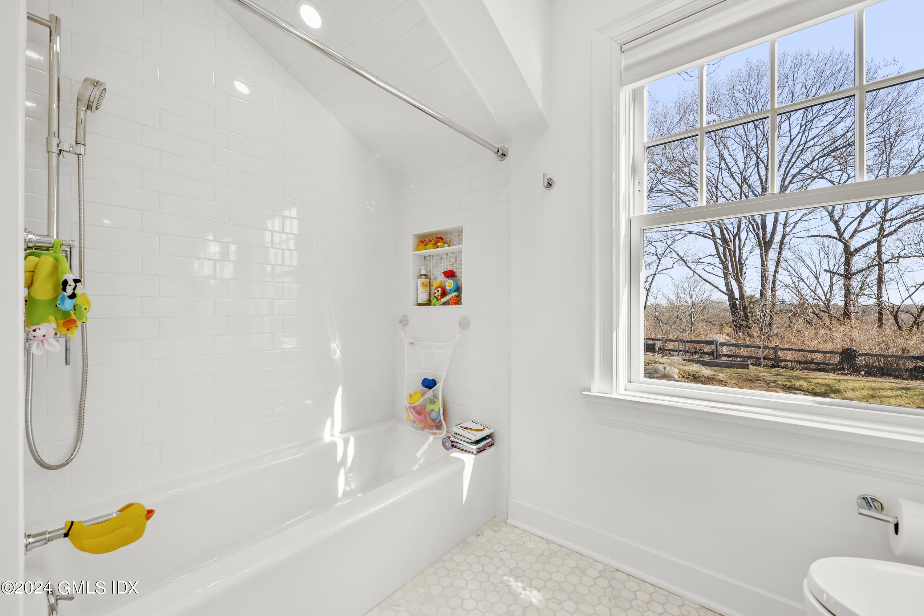 18 Annjim Drive Greenwich, CT 06830 - Photo 16 of 23 a bathroom with a bath tub and a shower