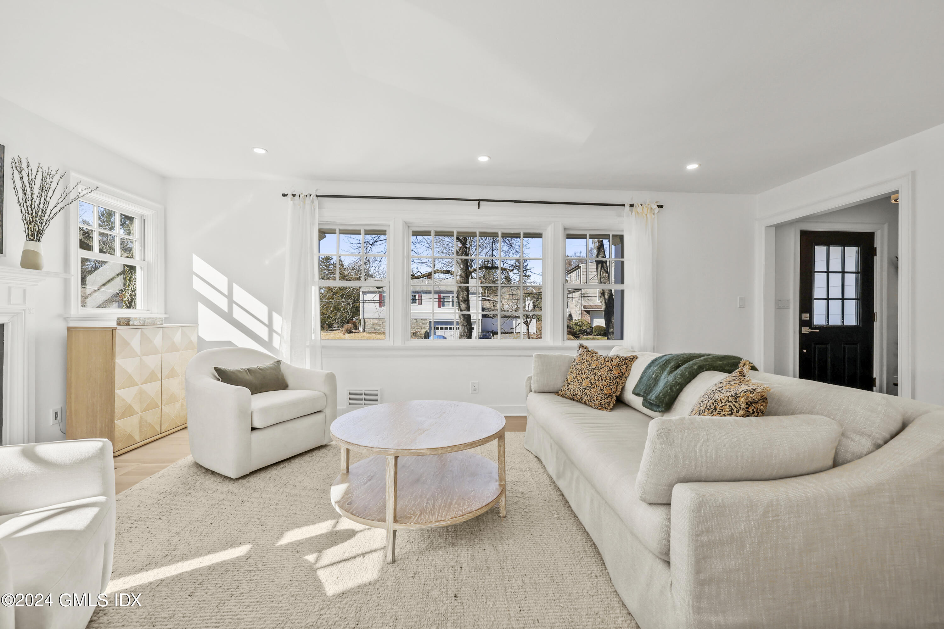 18 Annjim Drive Greenwich, CT 06830 - Photo 5 of 23 a living room with furniture and a large window
