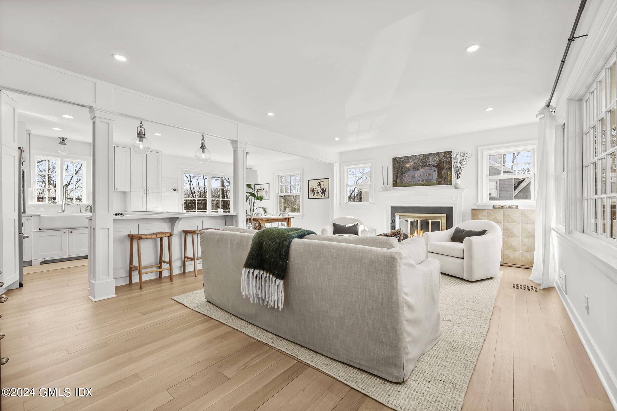 18 Annjim Drive Greenwich, CT 06830 - Photo 6 of 23 a living room with furniture and a fireplace