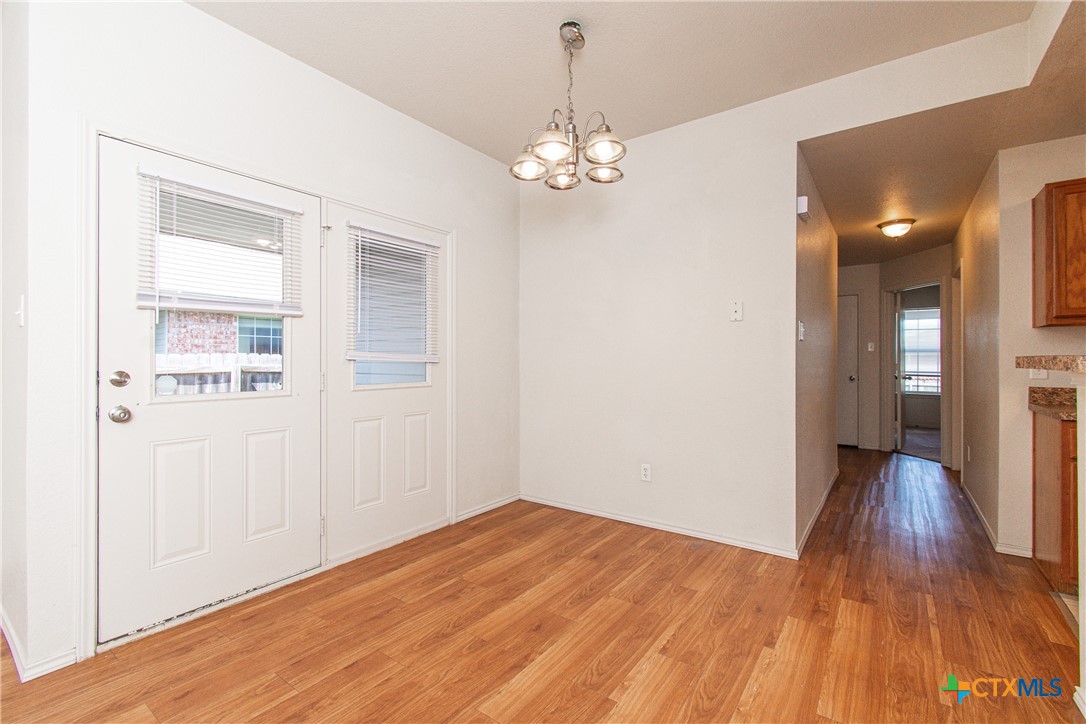 6509 Temora Loop, Unit A Killeen, TX 76549 - Photo 5 of 19 a view of empty room with wooden floor