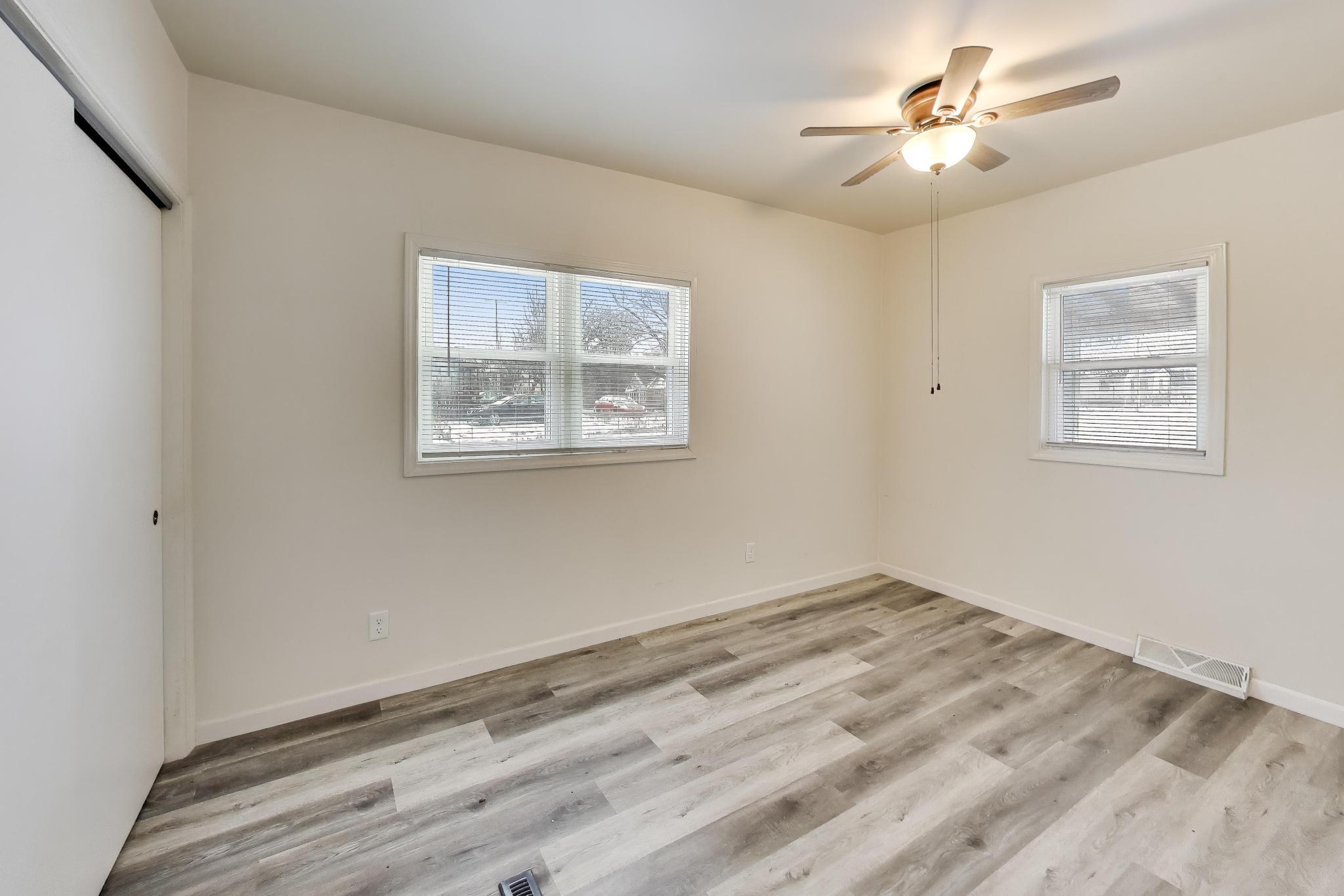 3561 Liverpool Road Lake Station, IN 46405 - Photo 8 of 16 a view of empty room with wooden floor