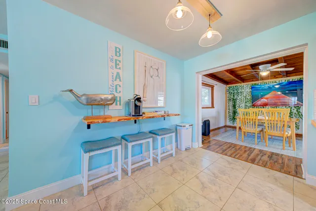 a kitchen with stainless steel appliances a sink and cabinets