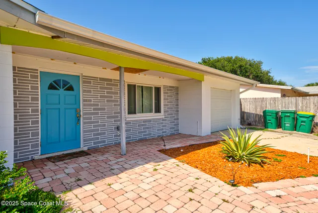a view of a house with a patio