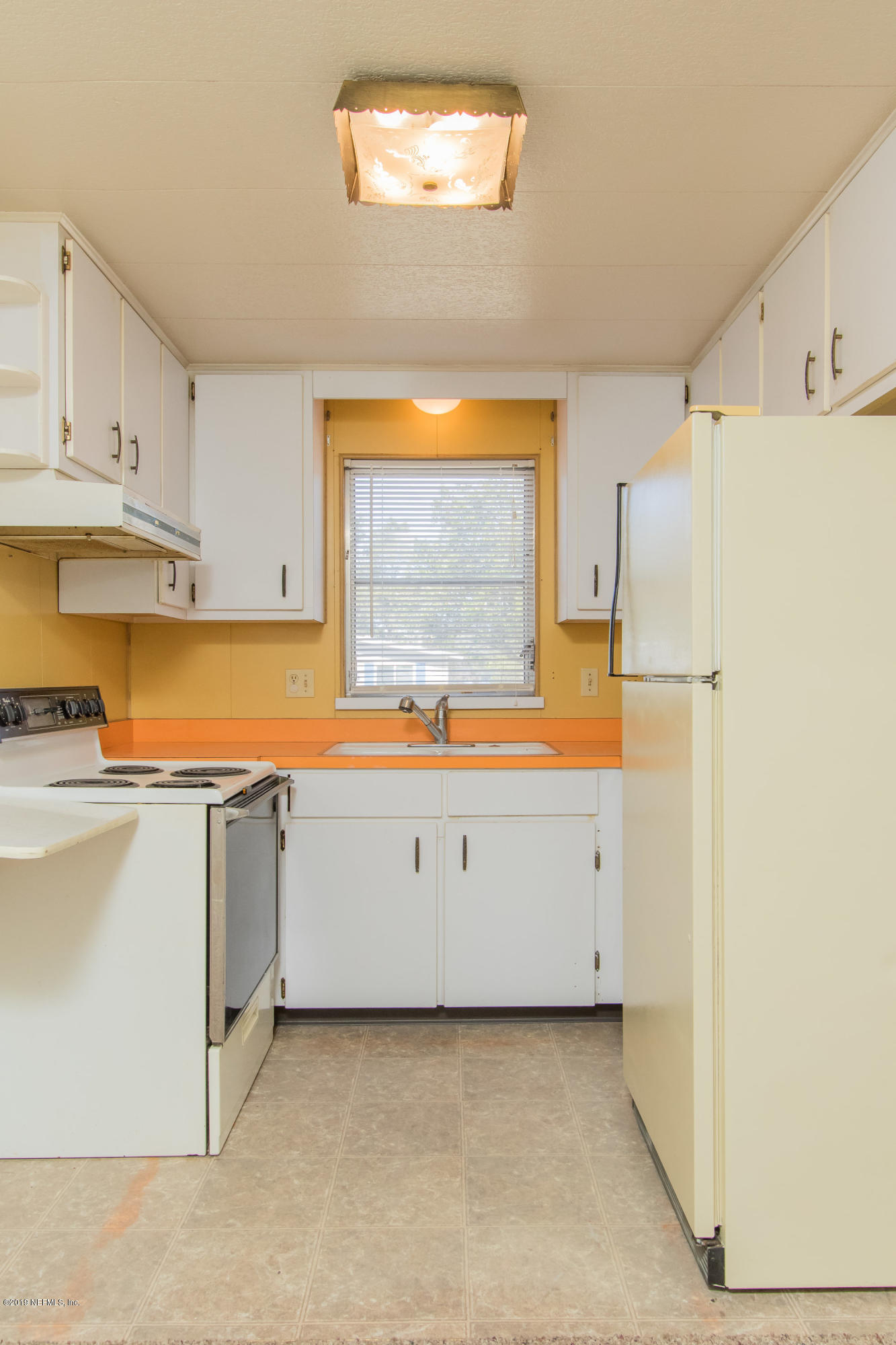 893 Palermo Road St. Augustine, FL 32086 - Photo 17 of 25 a view of a kitchen with electric appliances