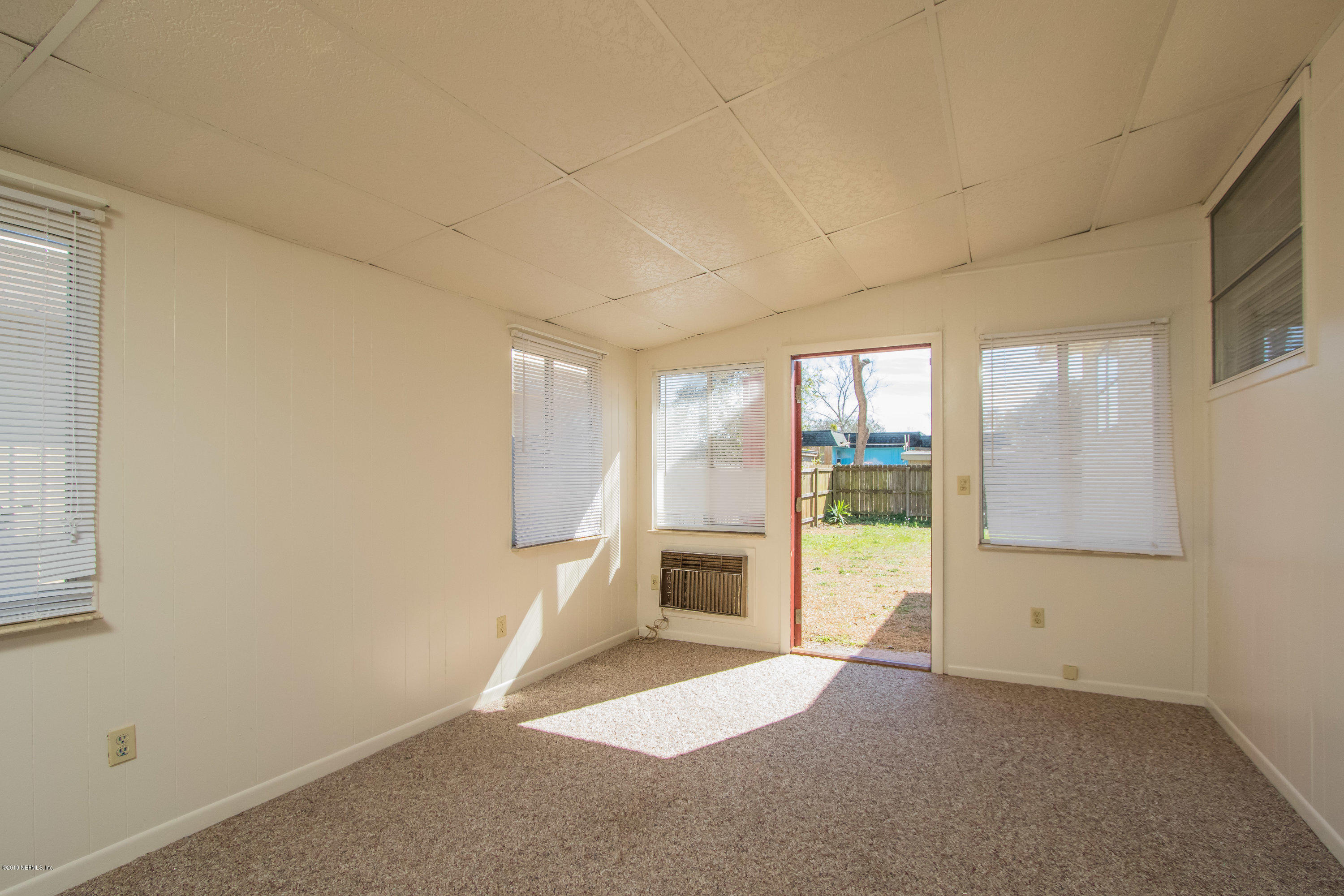 893 Palermo Road St. Augustine, FL 32086 - Photo 9 of 25 an empty room with windows