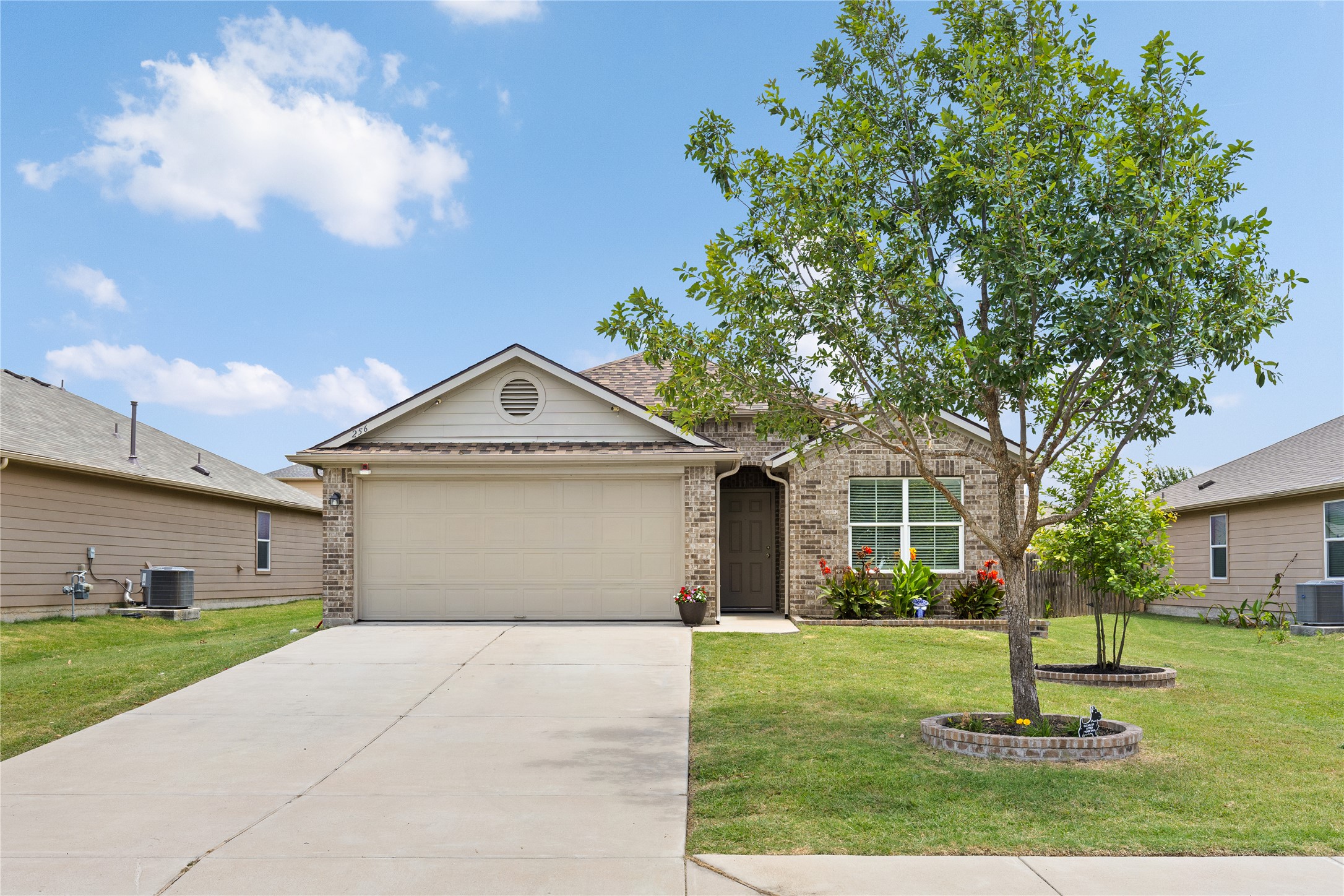 256 Alpha Kyle, TX 78640 - Photo 1 of 27 A classic brick exterior and well-maintained lawn welcome you home.