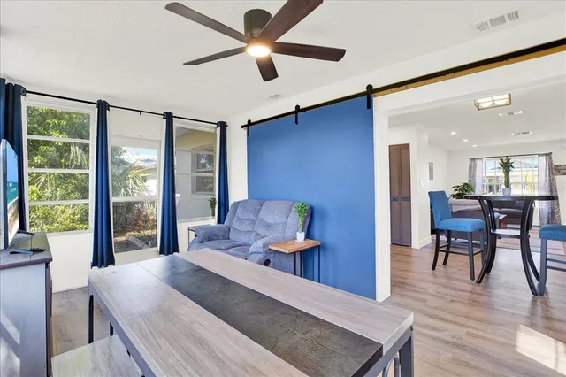 a bedroom with a bed and a table