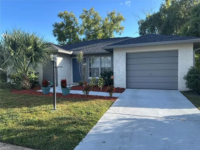 a view of a backyard with a garden