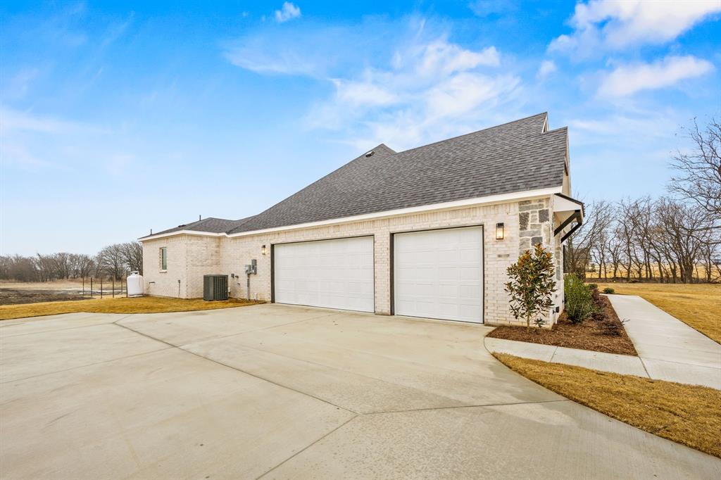 13835 Cashs Mill Road Sanger, TX 76266 - Photo 28 of 32 a view of a house with basketball court