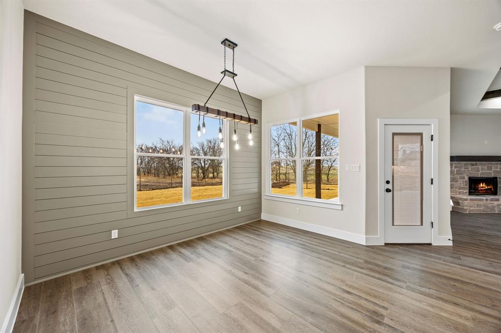13835 Cashs Mill Road Sanger, TX 76266 - Photo 7 of 32 a view of livingroom with furniture wooden floor and window