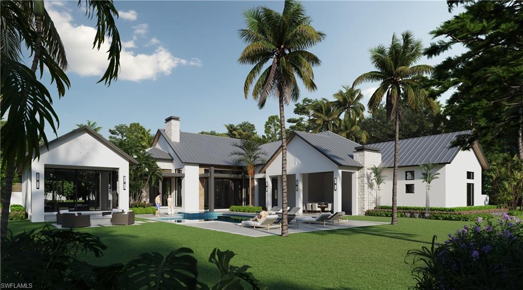 4854 Boxwood Way Naples, FL 34116 - Photo 5 of 5 a front view of a house with garden