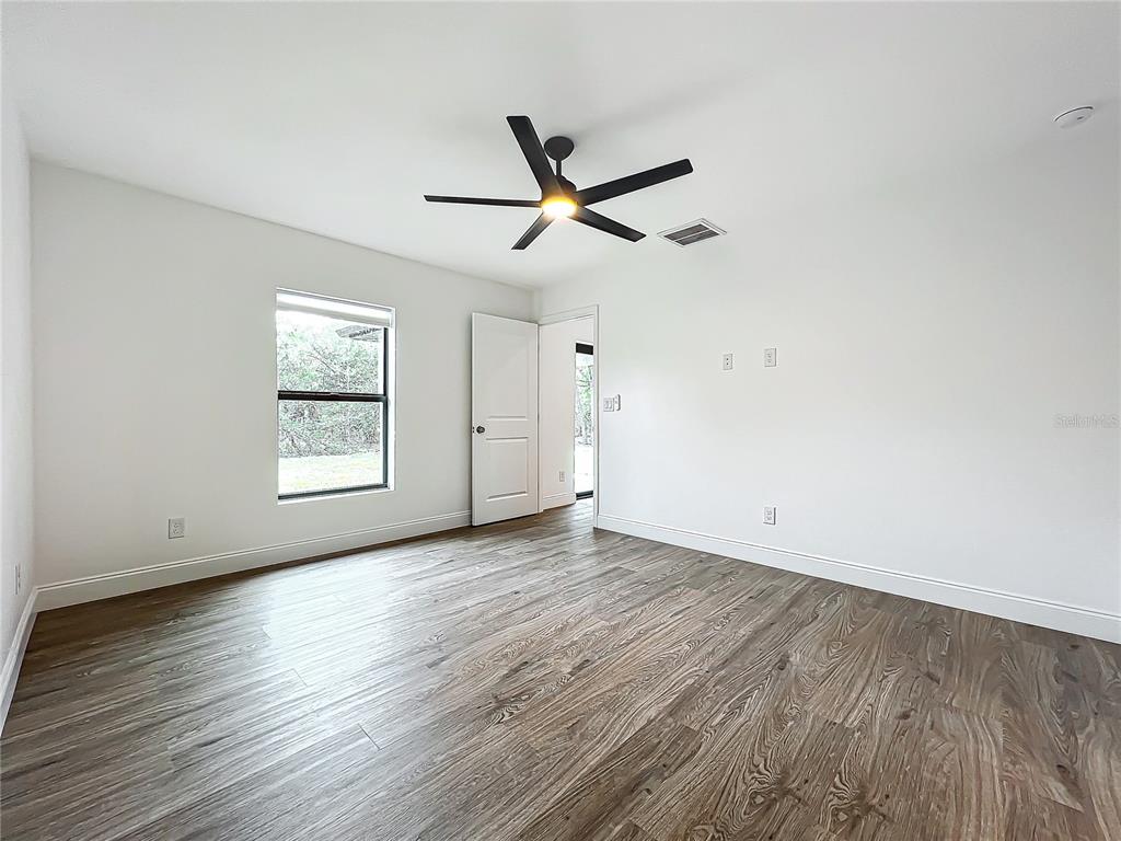 7076 Lippman Road Port Charlotte, FL 33981 - Photo 33 of 63 Master Bed