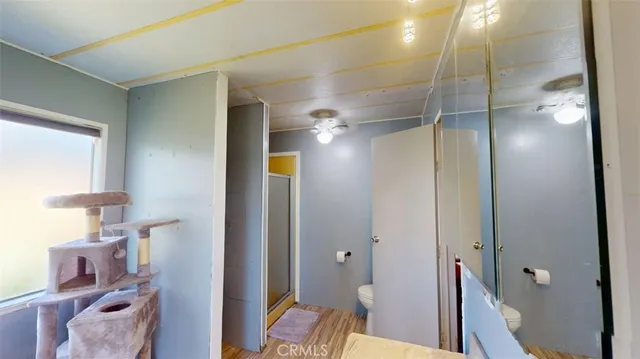 a view of a livingroom with wooden floor